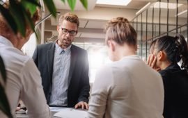 businessman-explaining-new-business-strategy-to-PDTRJUK.jpg
